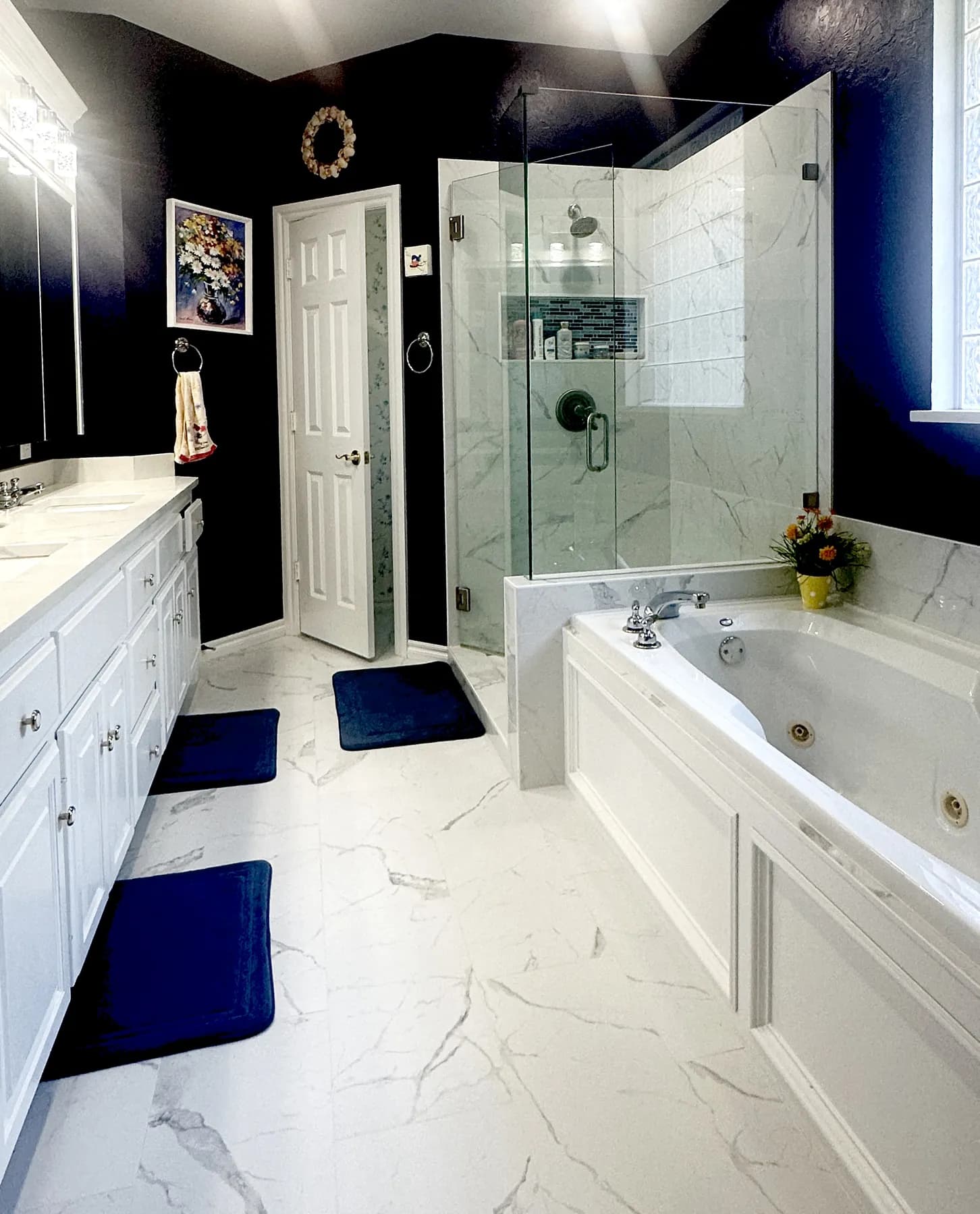 A clean, contemporary bathroom with white fittings